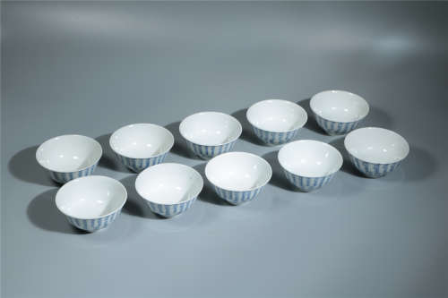 A SET OF TEN CHINESE BLUE AND WHITE TEA CUPS, QING DYNASTY, KANGXI PERIOD