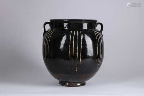 A CHINESE â€˜CIZHOUâ€™ WARE BLACK GLAZED JAR, JIN DYNASTY