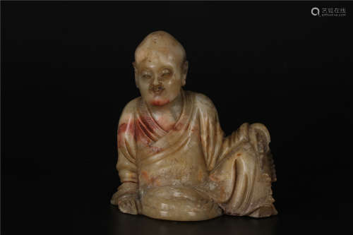 A CHINESE SOAPSTONE FIGURE OF LUOHAN, QING DYNASTY, QIANLONG PERIOD