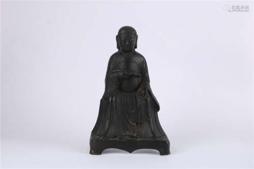 A CHINESE CARVED BRONZE FIGURE OF â€˜ZHENWUâ€™ , MINGN DYNASTY