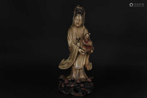 A CHINESE SOAPSTONE FIGURE OF GUANYIN, QING DYNASTY