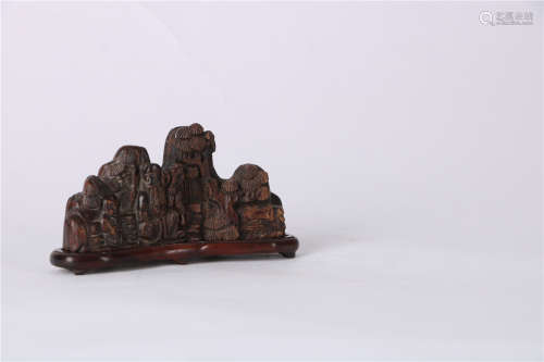 A CHINESE CARVED ALOESWOOD BRUSH REST, MING DYNASTY