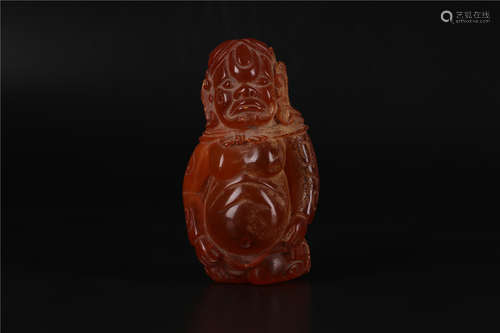 A CHINESE AMBER FIGURE OF BUDDHA, LIAO DYNASTY