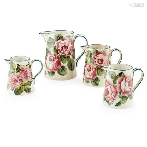 FOUR GRADUATED WEMYSS WARE JUGS 'CABBAGE ROSES' PATTERN, EARLY 20TH CENTURY variously marked (