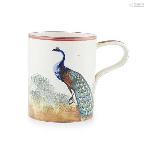 A RARE WEMYSS WARE MUG 'PEACOCK' PATTERN, CIRCA 1900 impressed mark WEMYSS, restored handle 14cm