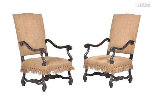 A pair of stained beech and hessian upholstered armchairs, in Continental early 18th century style