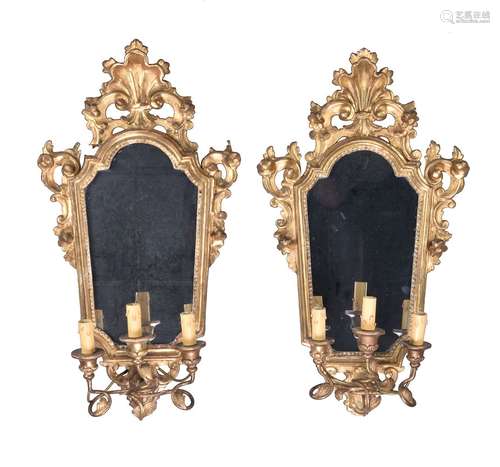 A pair of giltwood and composition three light girandoles