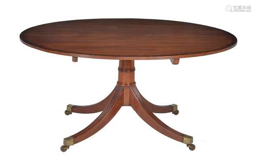 ϒ A Regency mahogany and rosewood banded breakfast table