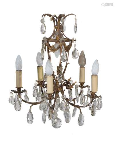 A gilt metal and cut glass hung five branch chandelier