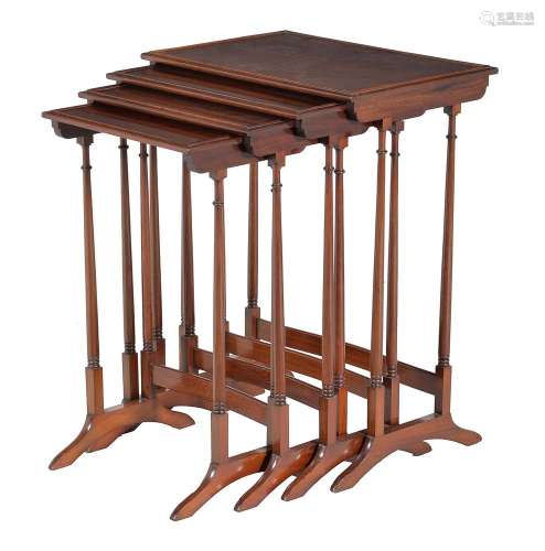 A nest of four mahogany quartetto tables