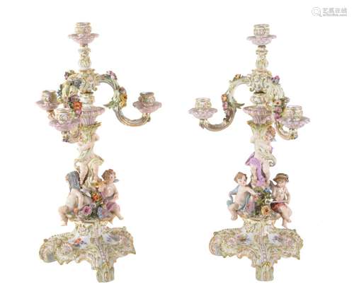 A pair of Meissen four light candelabra