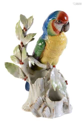 A German porcelain vase modelled as a macaw perched on a stump