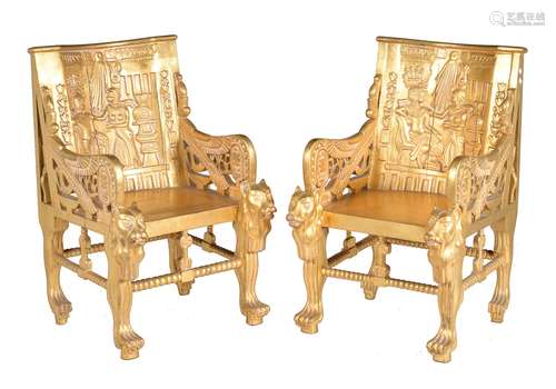 A pair of carved giltwood armchairs