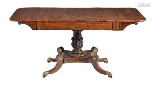 ϒ A George IV rosewood and brass inlaid sofa table
