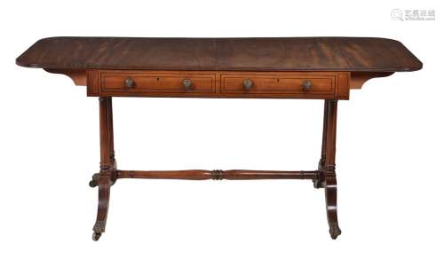 ϒ A Regency mahogany and ebony inlaid sofa table