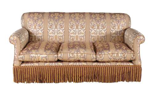An upholstered three seat sofa in Victorian style