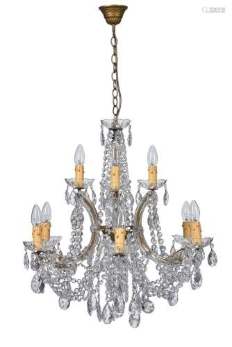 A pair of Continental moulded glass and gilt metal mounted nine light chandeliers