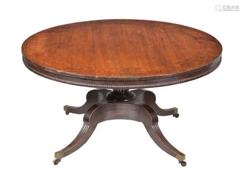 A George IV oak and pollard oak banded centre table