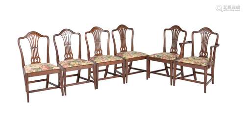 A set of twelve mahogany dining chairs