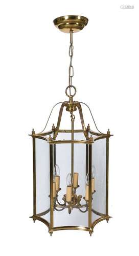 A gilt metal and glazed hexagonal hall lantern