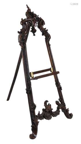 A Continental carved and stained walnut A-frame gallery easel