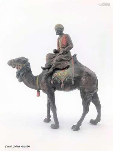 Man in polychrome Moorish camel