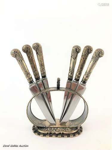 Set of six knives with their original sterling silver