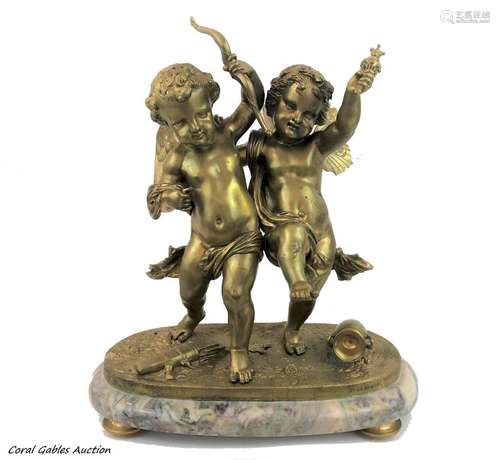 Antique bronze sculpture of two angels.