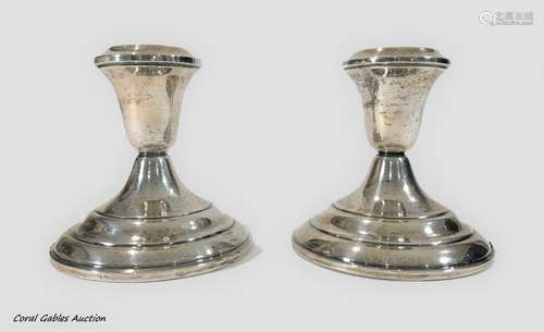 Two Weighted Sterling Silver Candlesticks