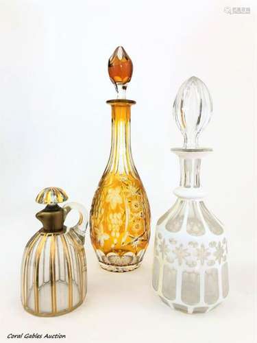 Three antiques liquor bottles