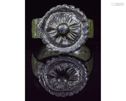 MEDIEVAL BRONZE RING WITH SUN SYMBOL