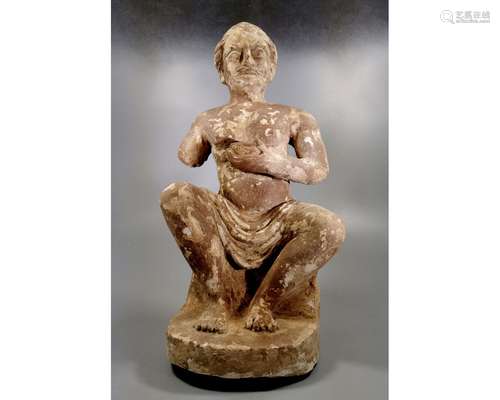 RARE GANDHARA EMPIRE STUCCO OF A SEATED NOBLEMAN