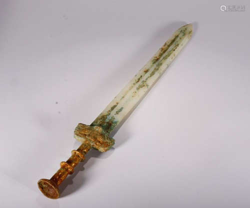 AN ANCIENT SWORD WITH BRONZE HILT AND ANTIQUE JADE BLADE