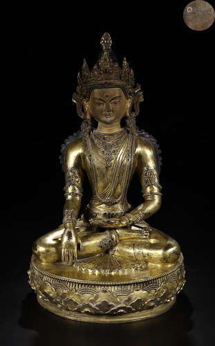 A GILT SILVER FIGURE OF  TARA SITTING STYLE BUDDHA