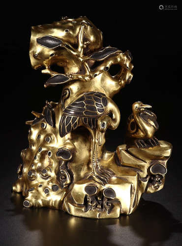 A GILT BRONZE CARVED CRANE ORNAMENT