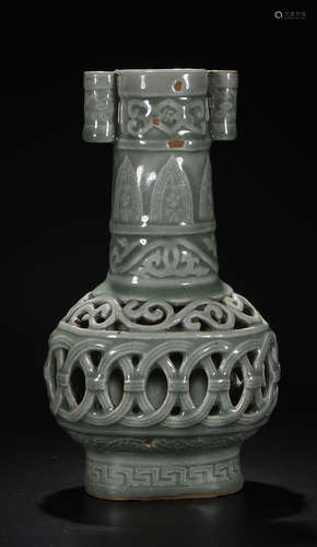 A LONGQUAN YAO HOLLOW CARVED TWO-EAR VASE