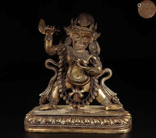 A GILT SILVER FIGURE OF MAHAKALA BUDDHA