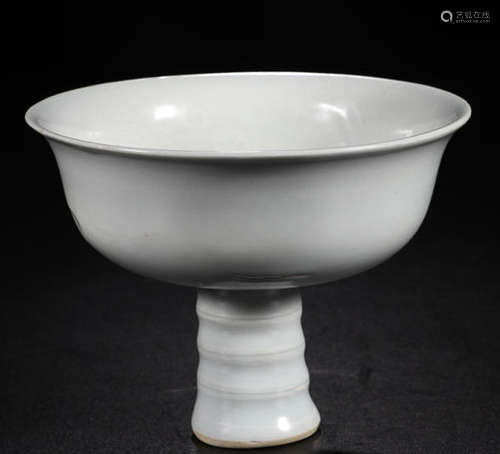 A WHITE GLAZE CARVED DRAGON HEIGHT STEM BOWL