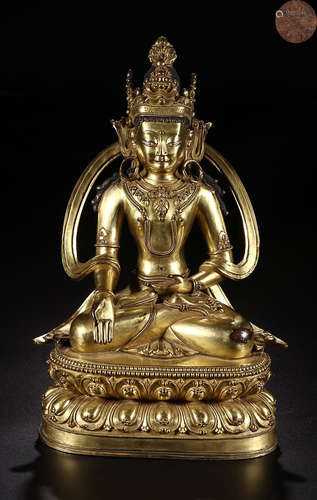 A GILT BRONZE LONGEVOUS BUDDHA