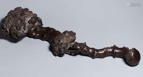 A HUANGYANG WOOD RUYI ORNAMENT