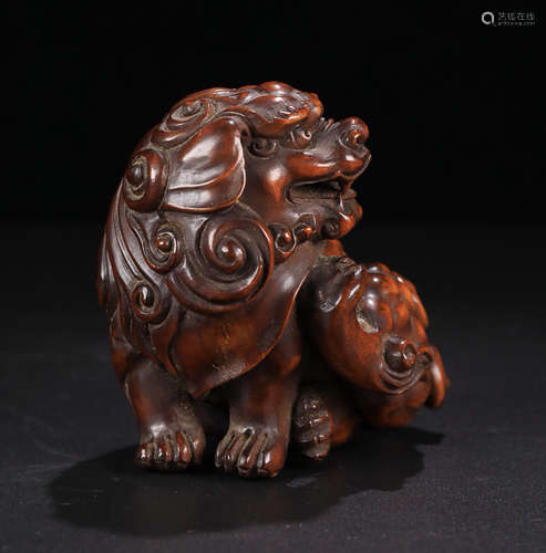 HUANGYANG WOOD LION ORNAMENT