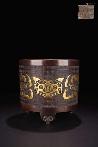 A GILT BRONZE CENSER IN BEAST FACE PATTERN