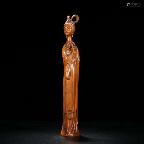 A HUANGYANG WOOD OF FIGURE SHAPED STATUE