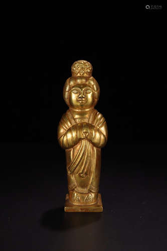 A GILT BRONZE FIGURE SHAPED ORNAMENT