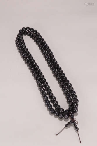 A CHENXIANG WOOD ROSARY EMBEDED SILVER
