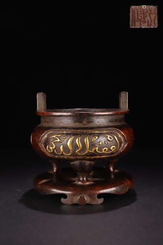 A GILT BRONZE TRIPOD CENSER WITH POETRY CARVING