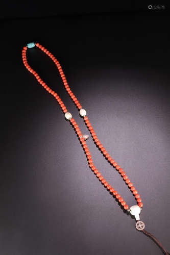 A RED CORAL ROSARY WITH 108 BEADS