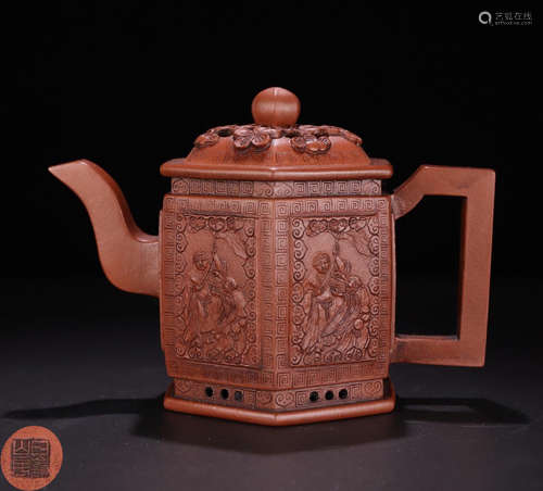 A ZISHA CARVED FIGURE PATTERN TEA POT