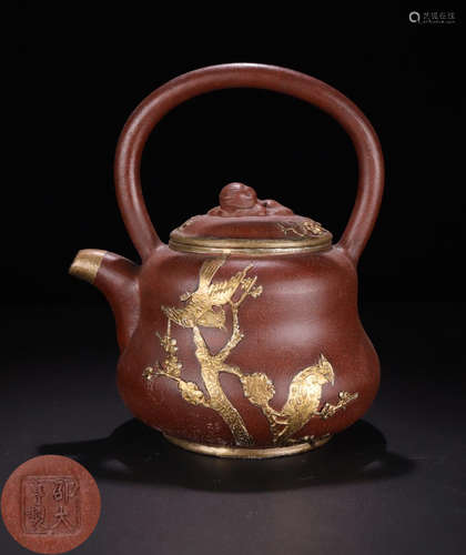 A ZISHA CARVED BIRD PATTERN TEA POT