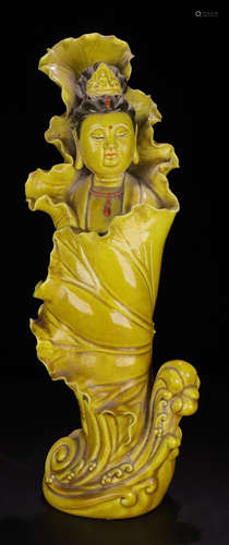 A YELLOW GLAZE GUANYIN BUDDHA